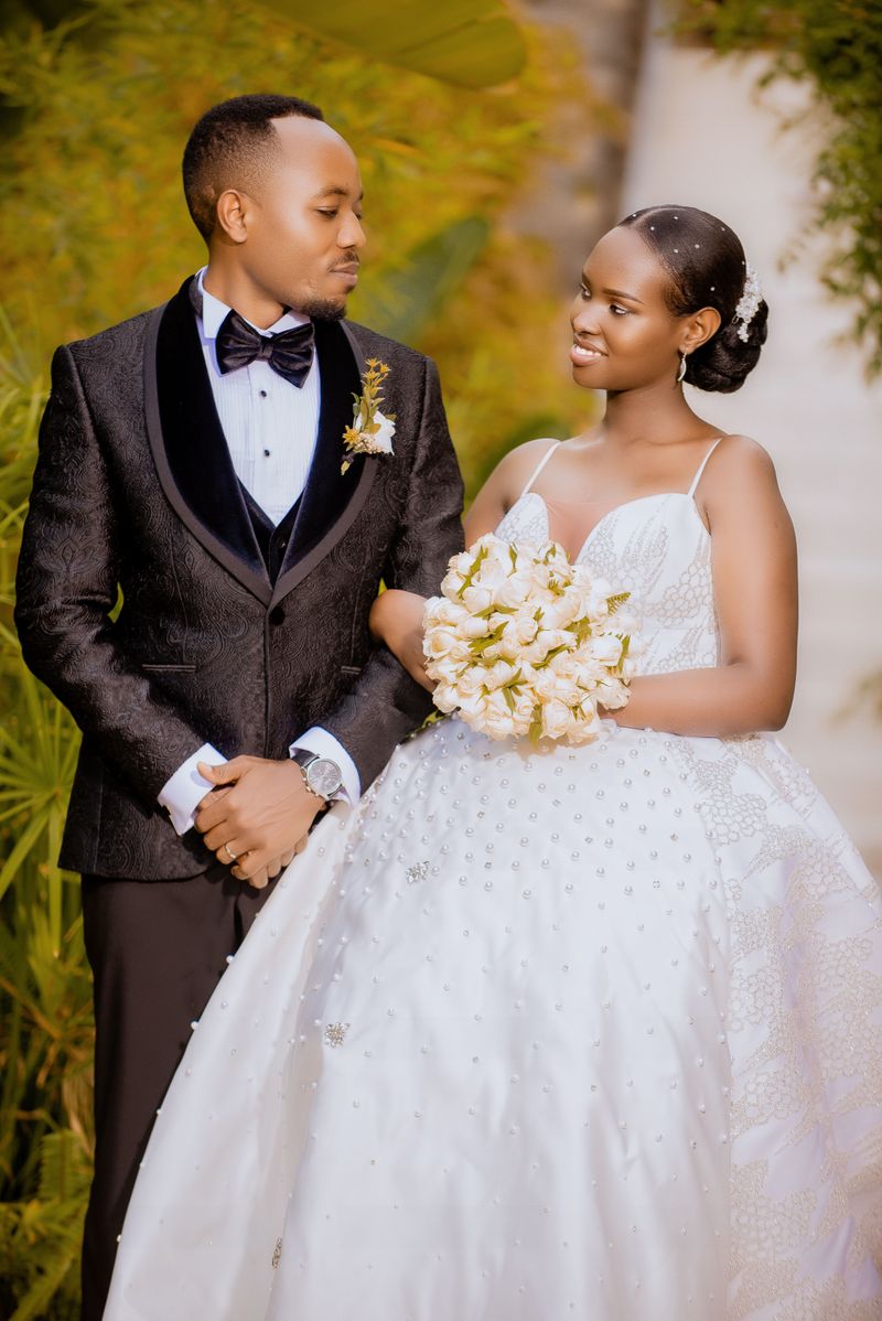 Black bride and groom looking at each other
