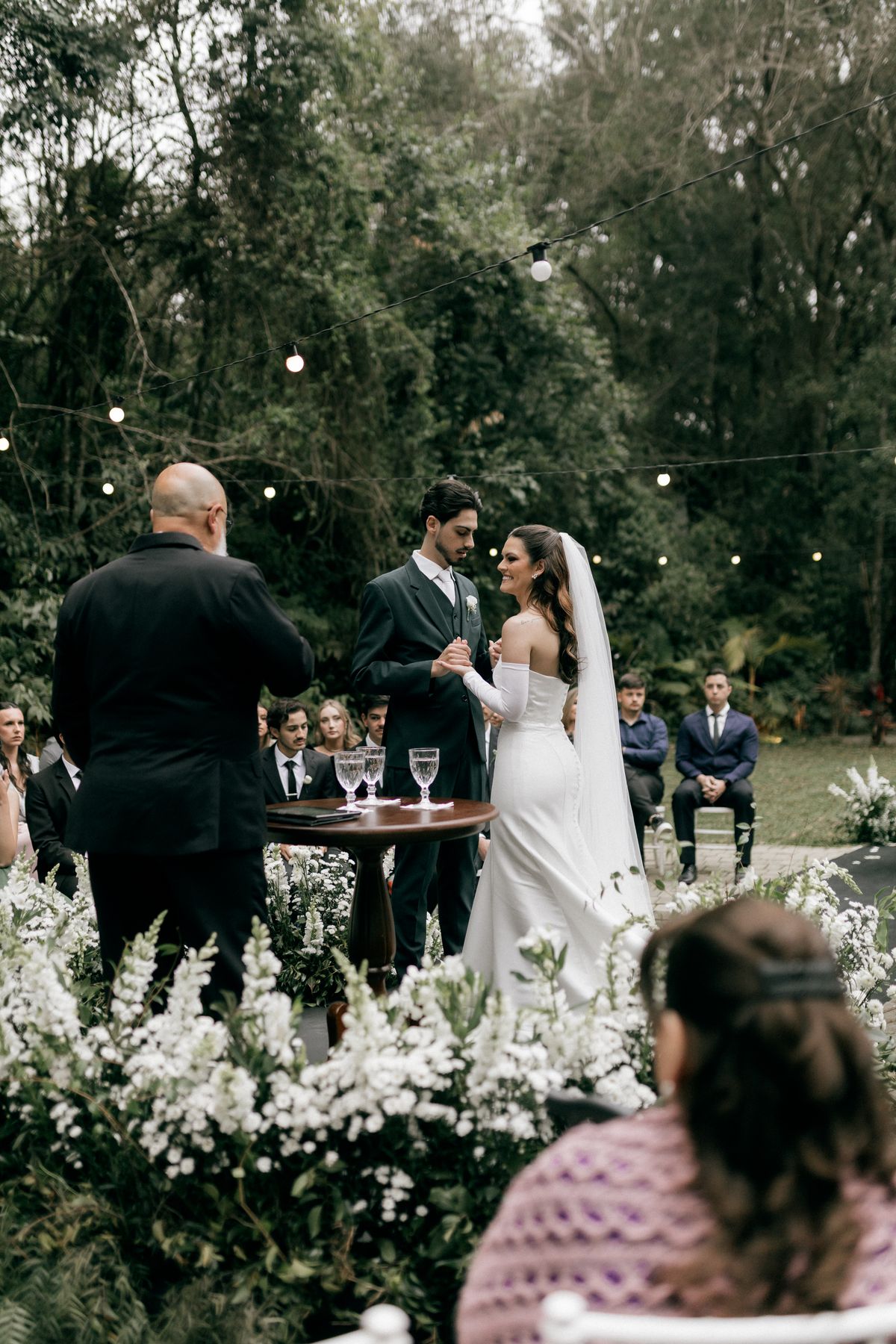 Wedding vows beneath trees