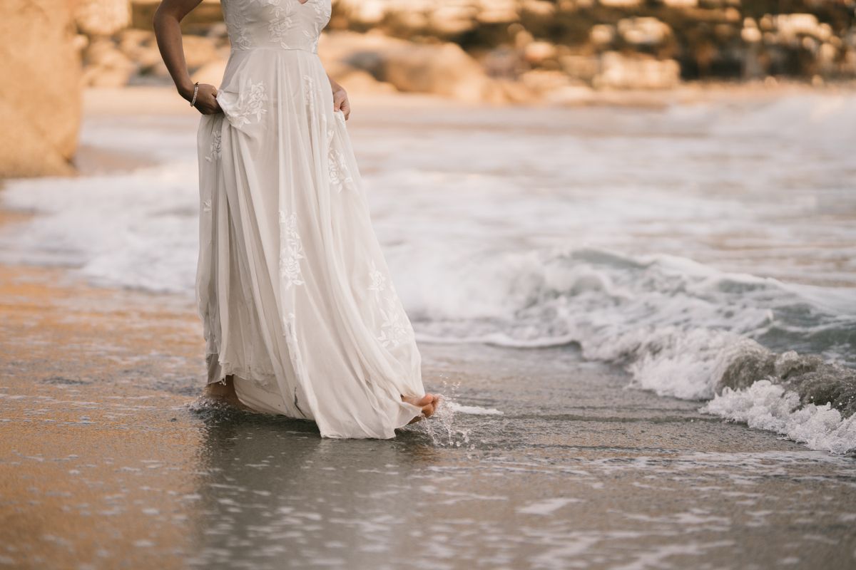 Bridal gown beside the ocean